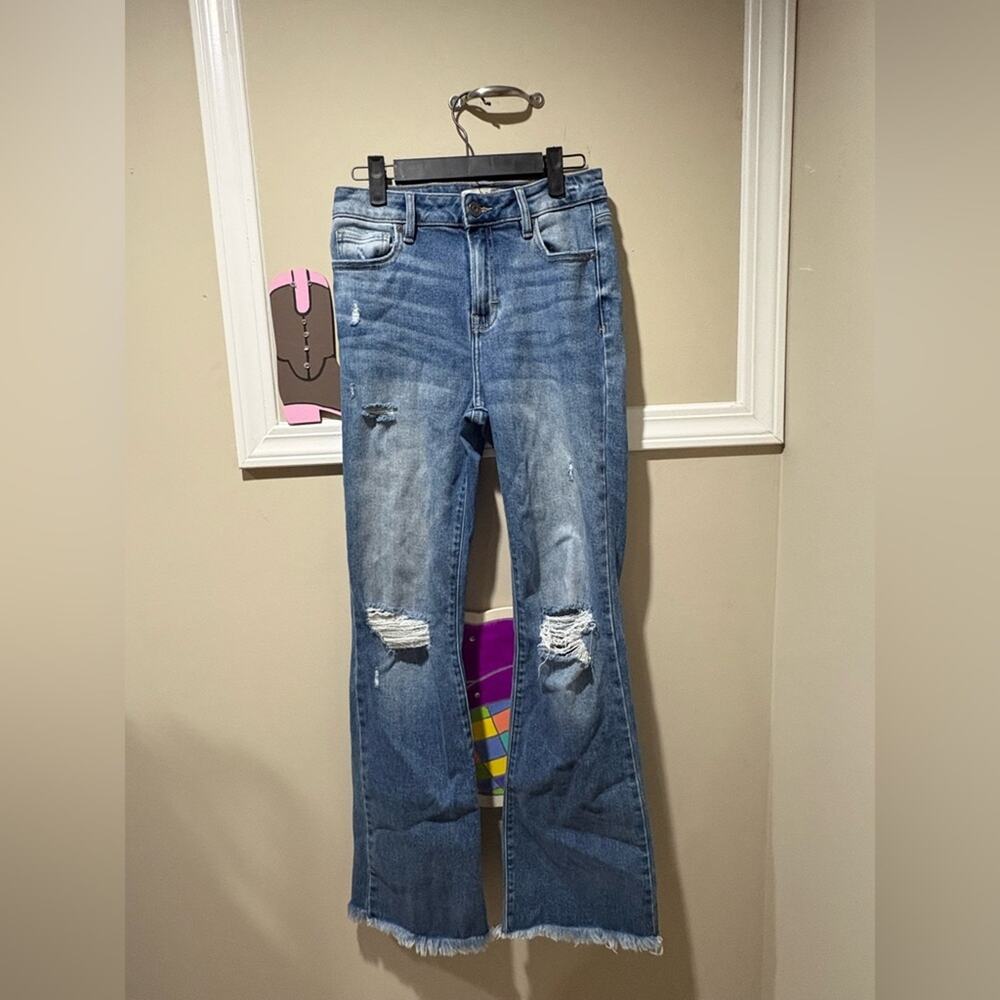 Stylish Blue Flare Jeans with Distressed Accents